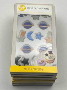 lot 162 image: Wilton Galaxy Space Theme Icing Decorations Set