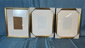 lot 2100 image: Kate & Laurel Set Of 3 Gold Picture Frames 11x14 Matted To 5x7.