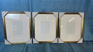 lot 2134 image: Kate & Laurel Set Of 3 Gold Photo Frames 11x14 Matted To 5x7.