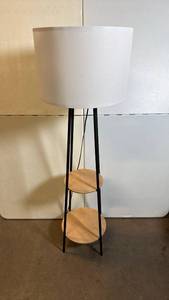 lot 8022 image: Black Metal Floor Lamp with Two Wood Shelves and White Shade