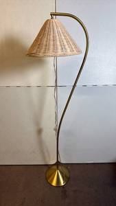 lot 8023 image: Mid Century Modern Brass Floor Lamp with Wicker Shade and Inline Floor Switch