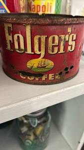 lot 40272 image: Folgers Mountain Grown Coffee Tin with Ship Logo
