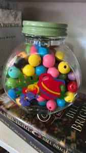 lot 40278 image: Antique Glass Jar with Colorful Wooden Beads