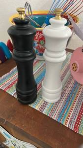 lot 40288 image: Black and White Salt and Pepper Mills with Brass Tops