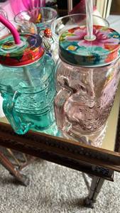 lot 40324 image: Glass Mason Jar Drinking Mugs with Floral Lids and Straws