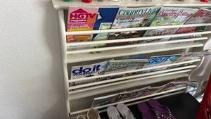 lot 40331 image: Pottery Barn White Wall-Mounted Magazine Rack Display Stand contents NOT included
