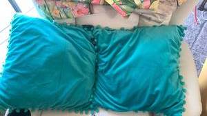 lot 40096 image: Turquoise Pom Pom Pillow Set with Phantoscope Brand Label