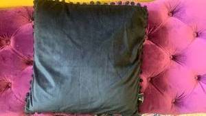 lot 40116 image: Phantoscope Black Throw Pillow with Pom Pom Trim
