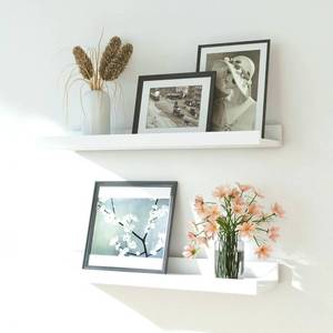 lot 19899 image: Solrot White Floating Shelves for Wall Decor, Wall Mounted Wood Storage Shelf for Bedroom, Living Room, Bathroom, Kitchen, Nursery, Display Picture Ledge Shelf with Lip Set of 2-16 Inches, White