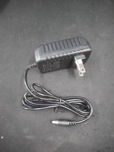 lot 6092 image: AC DC Power Adapter with Cable and Instructions