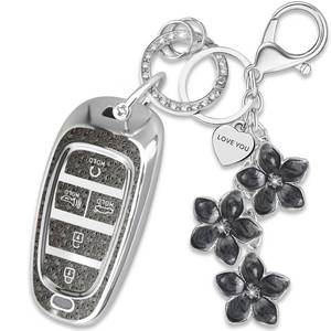 lot 6456 image: Yekoubo Black TPU Key Fob Cover with Sakura Flower Keychain Compatible with Hyundai Tucson 2022-2024,Sonata 2020-2023,Santa Cruz 2022-2024 5-Button Smart Key for Women