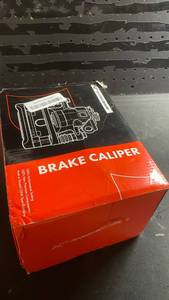 lot 11991 image: Automotive Brake Caliper Assembly