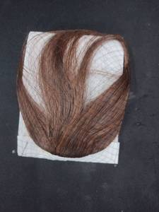 lot 6350 image: Ponytail wig light brown hair