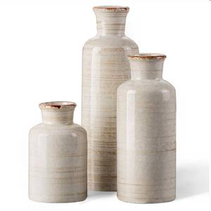 lot 13367 image: CwlwGO- Ceramic Rustic Vase 3 Piece Set,Small vase for Country Home Decoration,Modern Farmhouse Decor, Living Room Table Decoration, Bookcase, Fireplace and Entrance Decorations.(White) (One Damaged at Bottom)