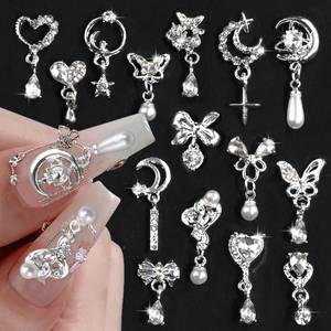 lot 4478 image: 15 Pcs Alloy Metal Silver Heart Bow Nail Rhinestones Y2K Charms, Star Moon Pendant Tassels Pearl Crystals 3D Shiny Butterfly Decorations for Nail Art Supplies