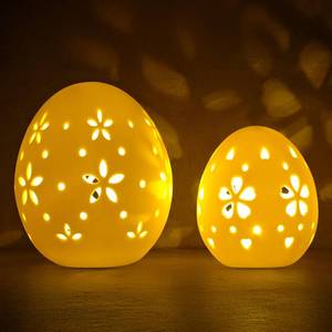 lot 14287 image: Pawliss Easter Decorations White Ceramic Lighted Easter Egg Set of 2, Farmhouse Rustic Hollow Easter Eggs Light Up Tabletop Statue, Easter Home Table Decor, Hunting Party Supplies Gifts for Kids