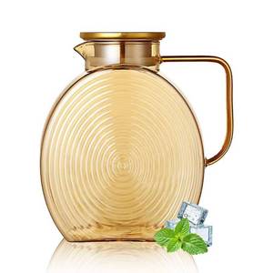 lot 9945 image: AEFPOYMXU 77oz Glass Water Pitcher with Gold Lid - 2.2L Large Capacity Jug with Wide Handle for Fridge, Iced Tea, Lemonade, Juice & Coffee
