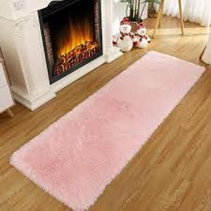 lot 1700 image: Pink fuzzy carpet 5 ft x 2 ft