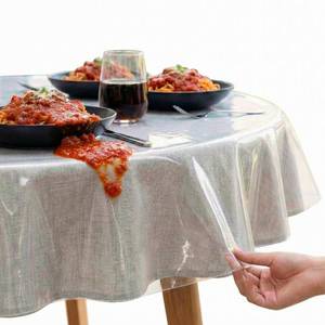 lot 16176 image: XFasten Round Plastic Table Cloth Cover 90 Inches 0.3mm Thick Waterproof Clear Plastic Tablecloth Protector, Non-Yellowing Plastic Table Cloths for Round Tables and Dining Room