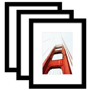 lot 16194 image: Wiscet 8x10 Picture Frame Set of 3, Display Pictures 5x7 with Mat or 8 x 10 without Mat, Photo Frame for Wall Mounting or Tabletop Display, Black