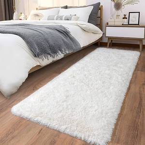 lot 1806 image: Ailyei Ultra Soft Runner Rugs for Bedroom Hallways with Upgraded Non-Slip Rubber Backing & Thick Memory Sponge, 2x8 Feet Fluffy Shag Throw Area Rug for Bedside Dorm Cream