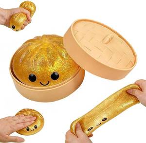 lot 2361 image: Dumpling Squishies, Glitter Dumpling, Glitter Dumplings Squishy with Box, Dumplings Sensory Squeeze Toy for Stress Relief Stretchy Desk Toys (Gold)