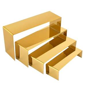 lot 2381 image: PROFIKLA 4 Pcs Gold Stainless Steel Display Risers, Display Stand for Cupcake Dessert Perfume Purse Handbag Shoe Jewelry and Funko Pop