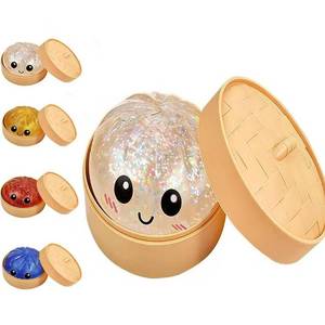 lot 12009 image: Glitter Dumpling Squishy, 2026 New Bun Squeeze Stress Relief Ball with Steamer Box for Stress Relief, More Surprises (White)