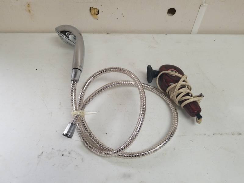lot 7585 image: Hand Held Shower Head and Vintage Vibrator