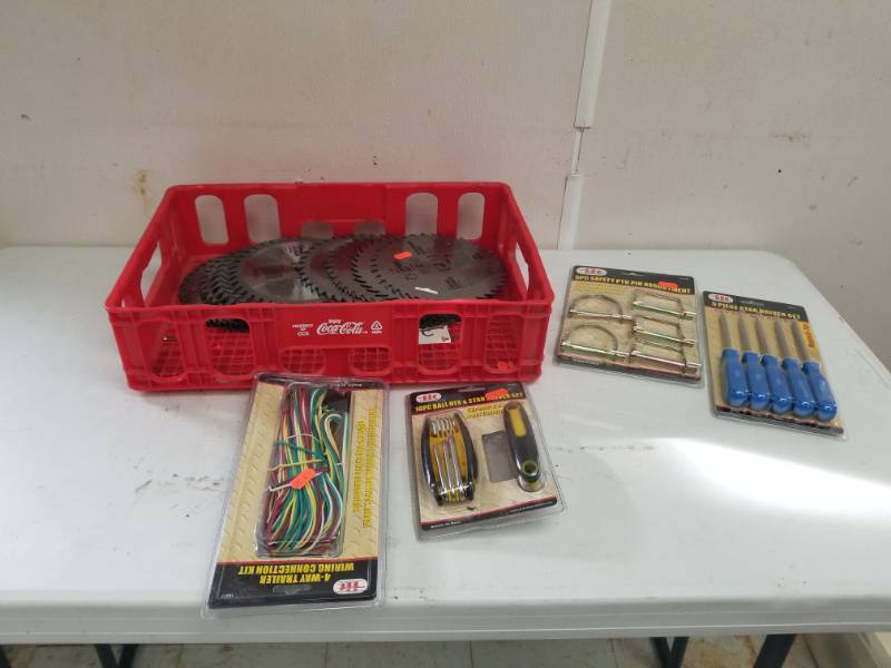 lot 7597 image: Crate of Circular Saw Blades, HexStar Drivers, PTO Pins Asst., Trailer Wiring Kit