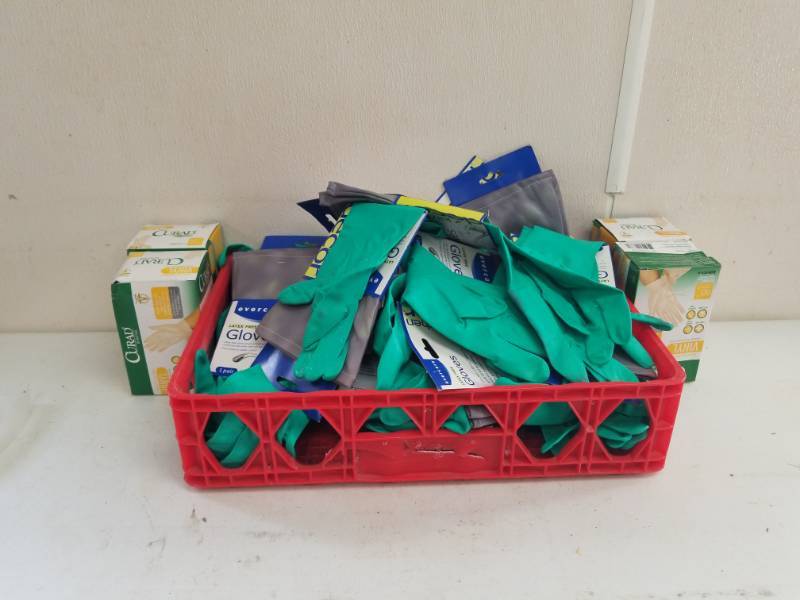 lot 7612 image: Boxes of Plastic  Rubber Gloves