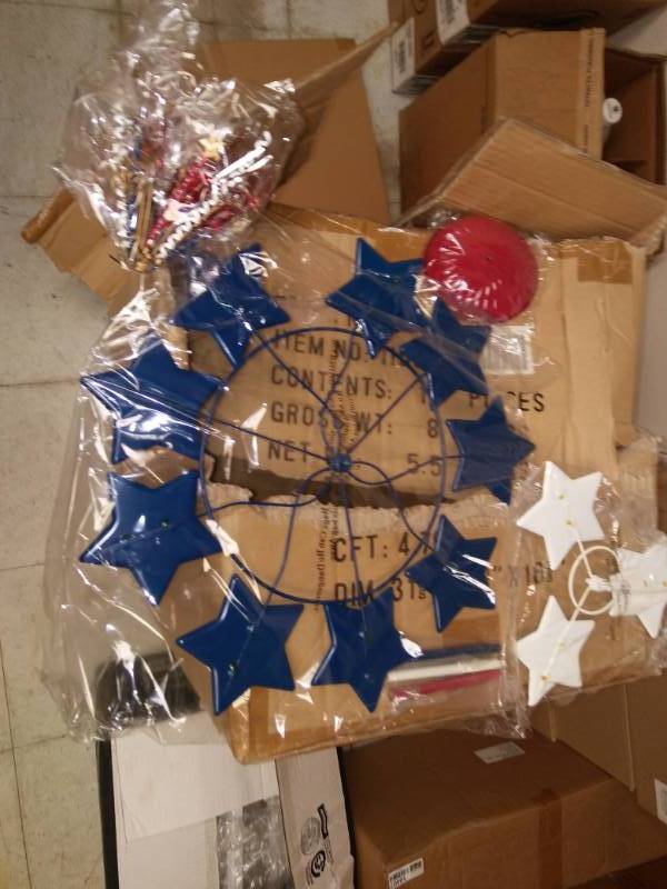 lot 10419 image: Case of Red White Blue Decorations and Case of Virginia Dare EL 15 Art Cream