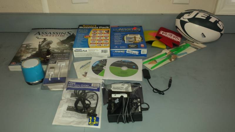 lot 7549 image: Computer Programs, Assassins Creed book, PhoneUSB Cords, Jets Football and more�
