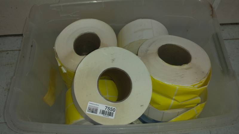 lot 7550 image: Tote full of Labels on Rolls