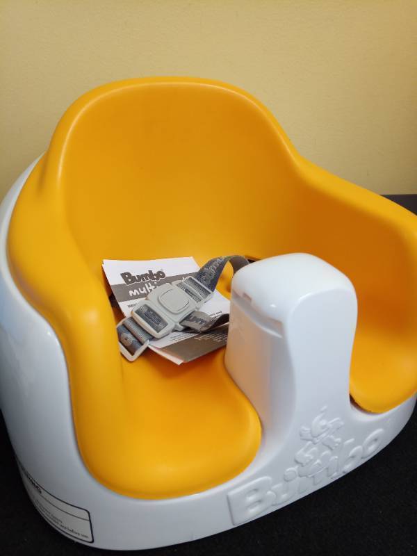 lot 1184 image: Bumbo 3-in-1 Baby Multi Seat Booster with Feeding Tray, 6-36 Months Old, Gold Retail $70