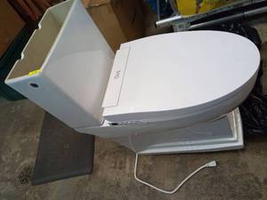 lot 1016 image: OVE Smart Bidet Toilet Seat with Electronic Controls - Retail $683