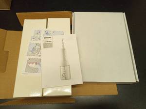lot 1020 image: Philips Sonicare Electric Toothbrush Complete System with Accessories 2- Pak - Retail $150