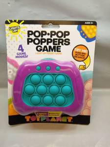 lot 1209 image: Pop Pop Poppers Light-Up Fidget Game - Retail $10