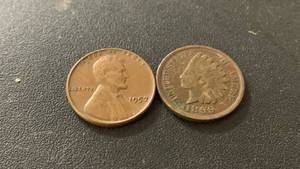 lot 22 image: Set of 2 Pennies - 1957 Lincoln Wheat Penny and 1899 Indian Head Penny