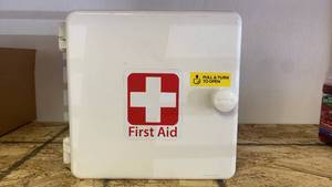 lot 51 image: White First Aid Cabinet used ITR80