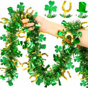lot 44440 image: 50FT St Patricks Day Decorations Garland Gold Horseshoe Green Hat Shamrock Tinsel Garland, Shiny Metallic Hanging Shamrock Decor Saint Patricks Day Decor for Home Indoor Outdoor Irish Party Supplies - Retail $22