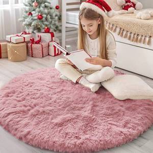 lot 45005 image: OLANLY Pale Pink Round Rugs for Bedroom - Machine Washable, 4 ft Circle Area Rugs for Living Room, Soft and Fluffy Shaggy Carpet for Teen Girls and Boys, Nursery Rooms, Dorms, Home Decor Aesthetic - Retail $26