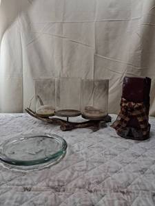 lot 81 image: Burgundy Pillar Candle with Glass Holder and Metal Base, clear glass holder, and three candle antler
