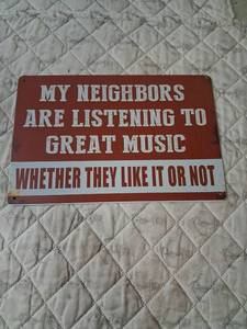 lot 131 image: Humorous Music Neighbors Metal Wall Sign