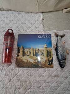 lot 137 image: Natures Dicks 2026 Calendar with Harley Davidson Water Bottle and Fish Plush Toy that flops.