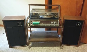 lot 960 image: Soundesign AMFM Stereo, Cassette Player, Turntable and 8 Track Player with Stand and Speakers.  Speakers 23 x 14 x 8.   Stand 30 x 27 x 15