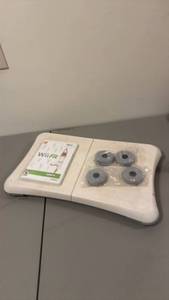 lot 1009 image: Wii balance board with spare feet and Wii Fit game