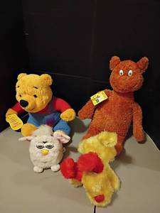 lot 1028 image: Furby, Winnie the Pooh, Hop on Pop from Dr. Seuss