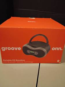lot 1035 image: ONN Portable CD Boombox.  With Bluetooth Wireless Technology