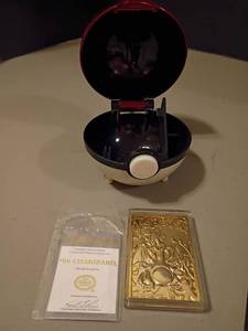 lot 1038 image: Pokemon 23k Gold Plated Trading Cards.  #6 Charizard